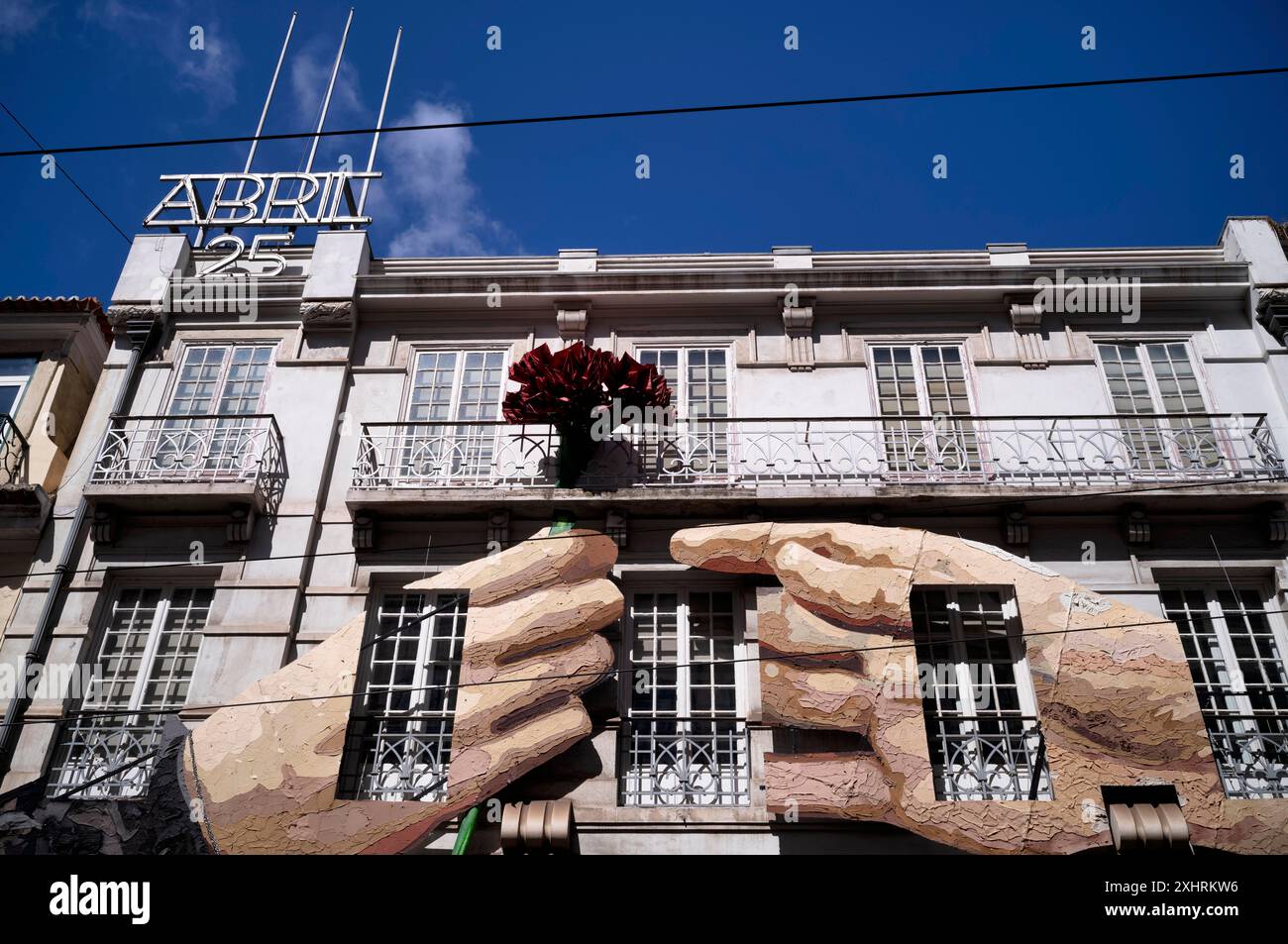 House facade, artwork commemorating the uprising of 25 April 1974 ...