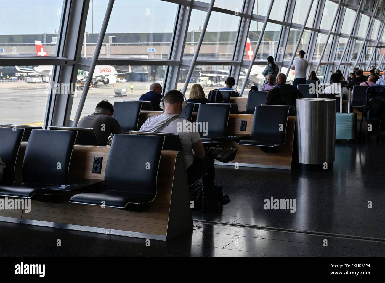 Airport gate passengers, Zurich Kloten, Switzerland Stock Photo