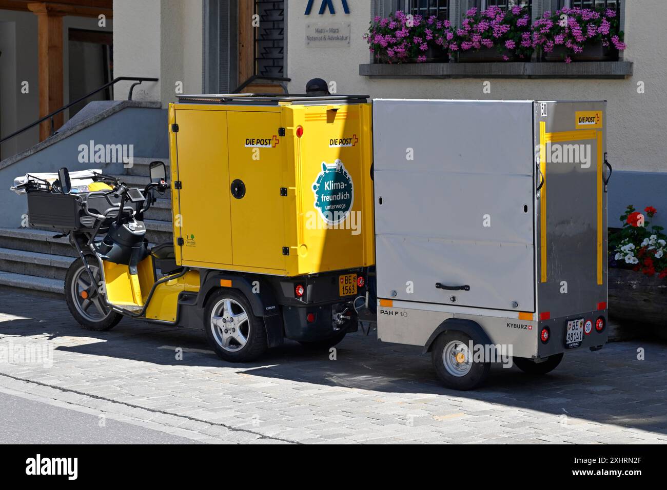 Postman tricycle moped electric Stock Photo