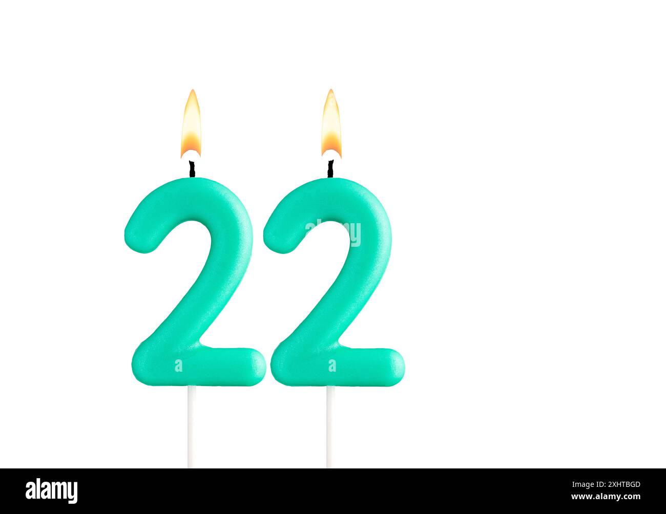 Birthday number 22 - Green birthday candle on white background Stock ...