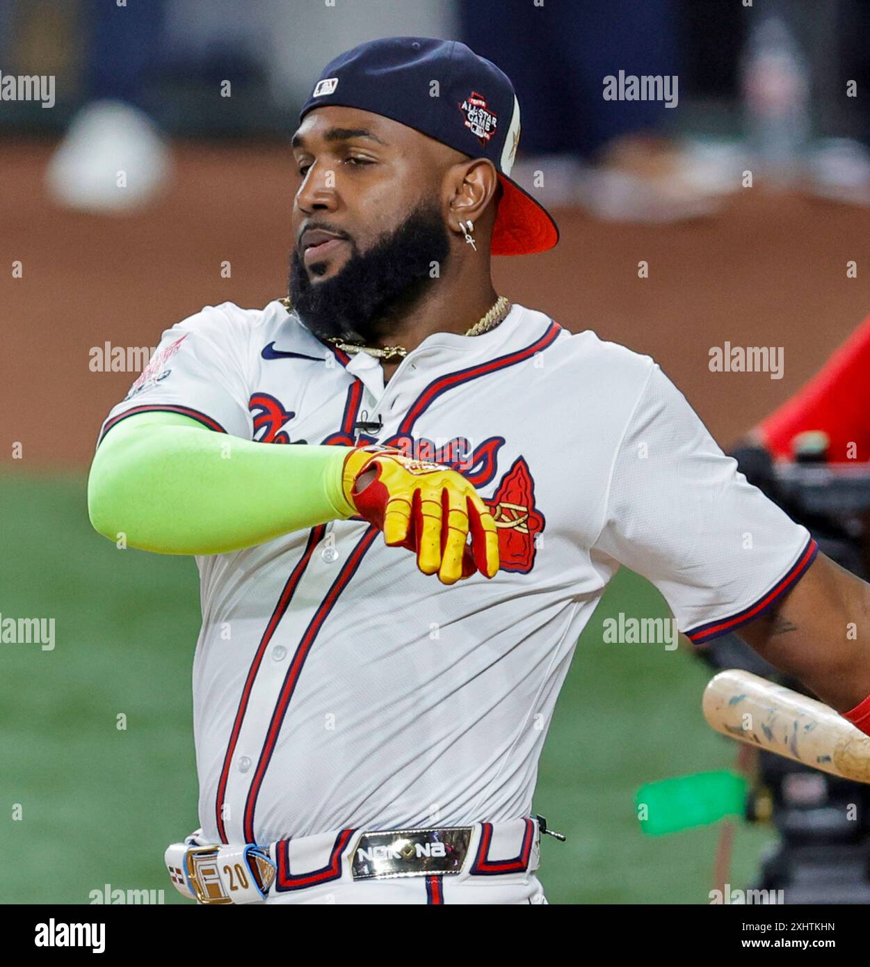 Atlanta Braves designated hitter Marcell Ozuna (20) follows through