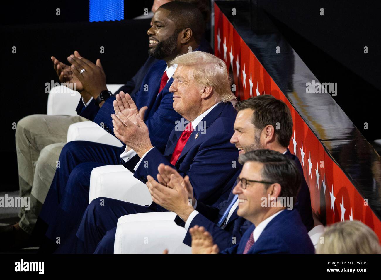 Former President Donald Trump sits next to his vice presidential pick ...