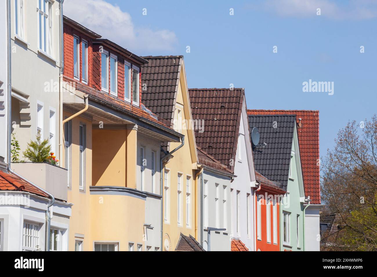 Residential buildings in spring, terraced houses, apartment buildings ...