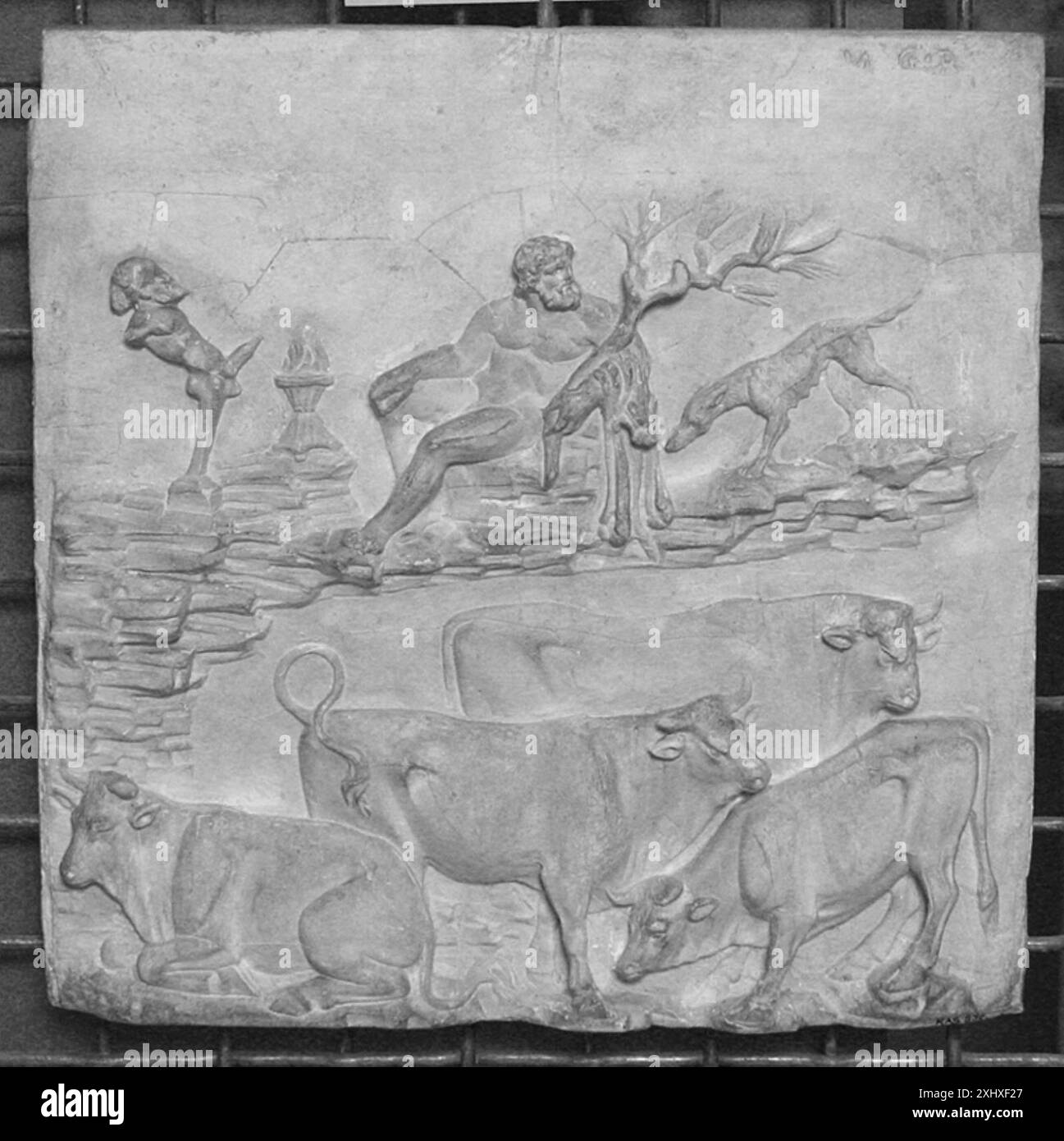 Bukolic landscape. Shepherd with dog and four cows undefined Relief Bukolisk landskab. Hyrde med hund og fire køer Stock Photo