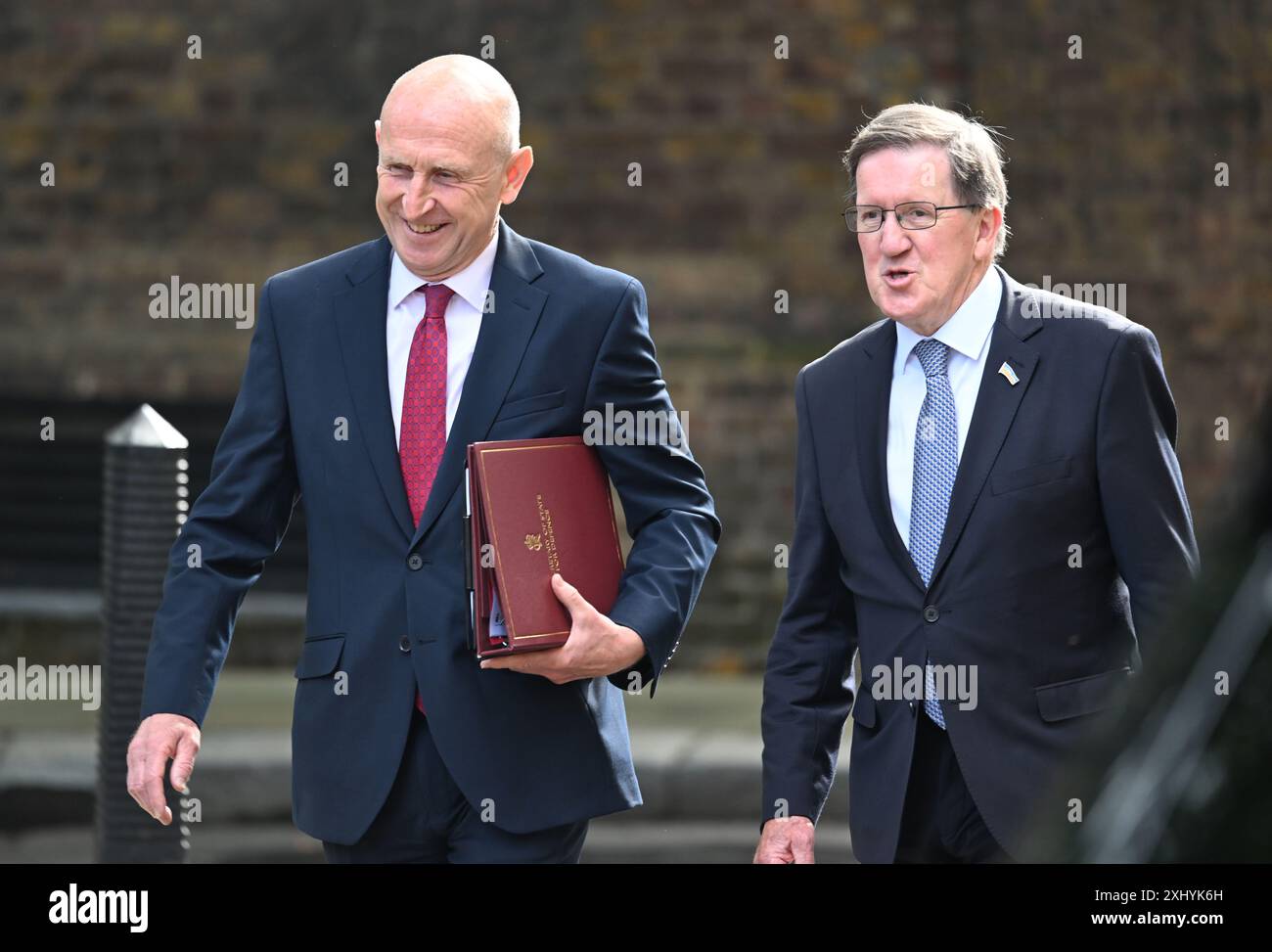 Downing Street, London, UK. 16th July, 2024. Government Ministers at the Cabinet Meeting. (Left): Rt Hon John Healey MP, Secretary of State for Defence. He is accompanied to the meeting by Lord Robertson, Special Adviser to BP. He was NATO Secretary General from 1999-2003 and UK Defence Secretary from 1997-1999. He is a government advisor to the major new defence review taking place. Credit: Malcolm Park/Alamy Live News Stock Photo