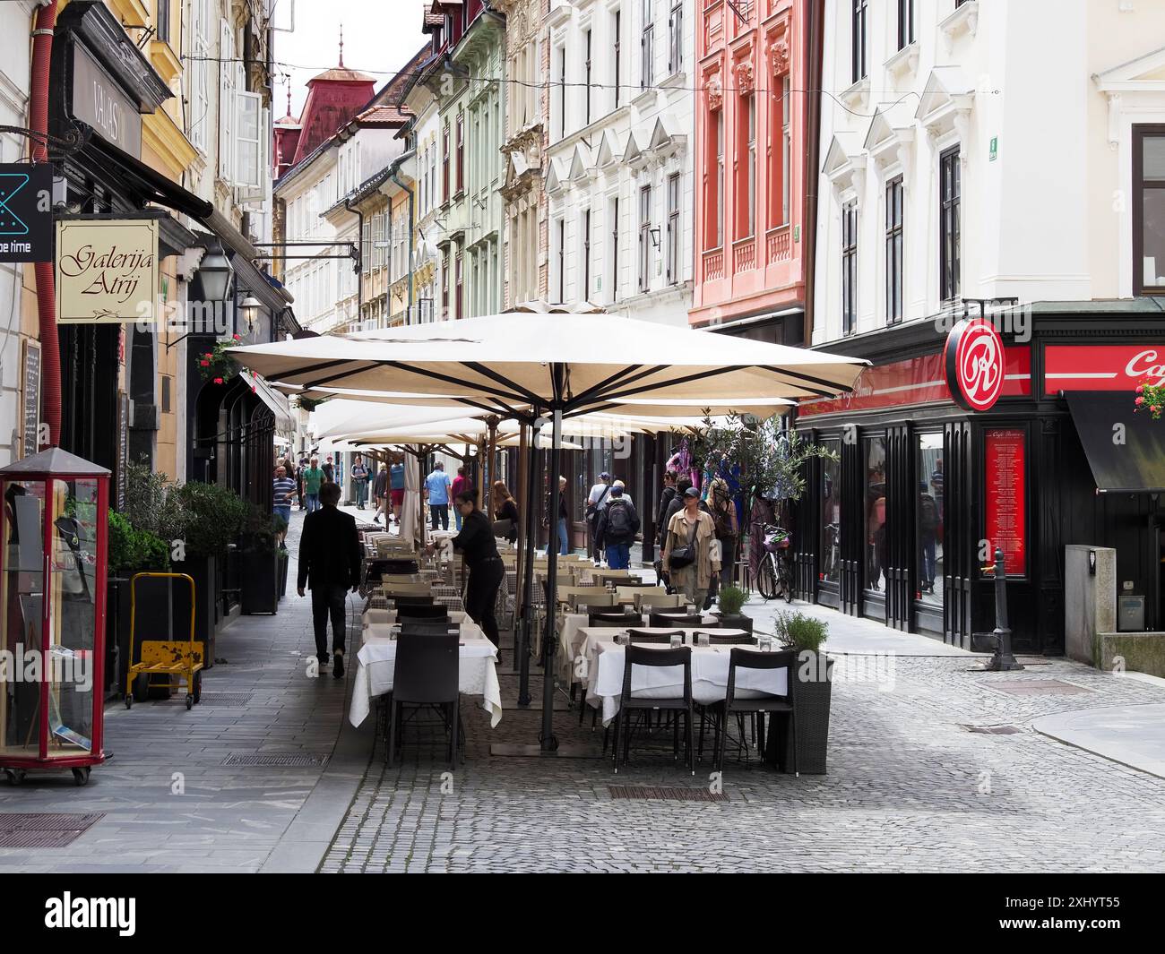Pavement restaurant on the cobbled Stari Trg in the old town Ljubljana Slovenia Stock Photo