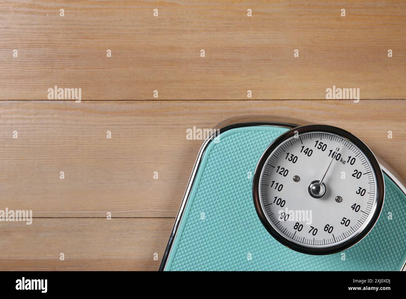 One scale on wooden floor, top view. Space for text Stock Photo - Alamy