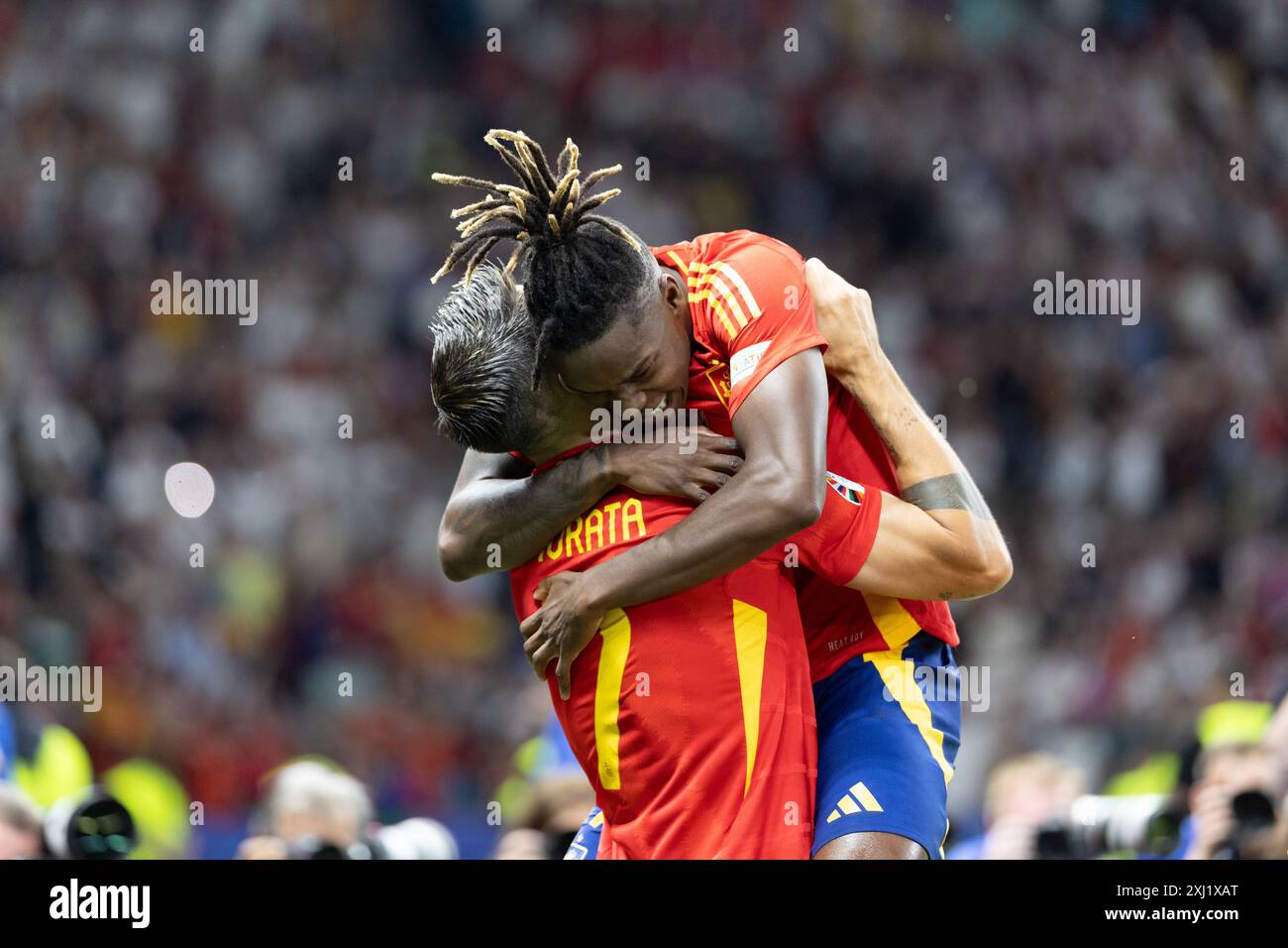 Nico Williams, Alvaro Morata seen celebrating after scoring goal during