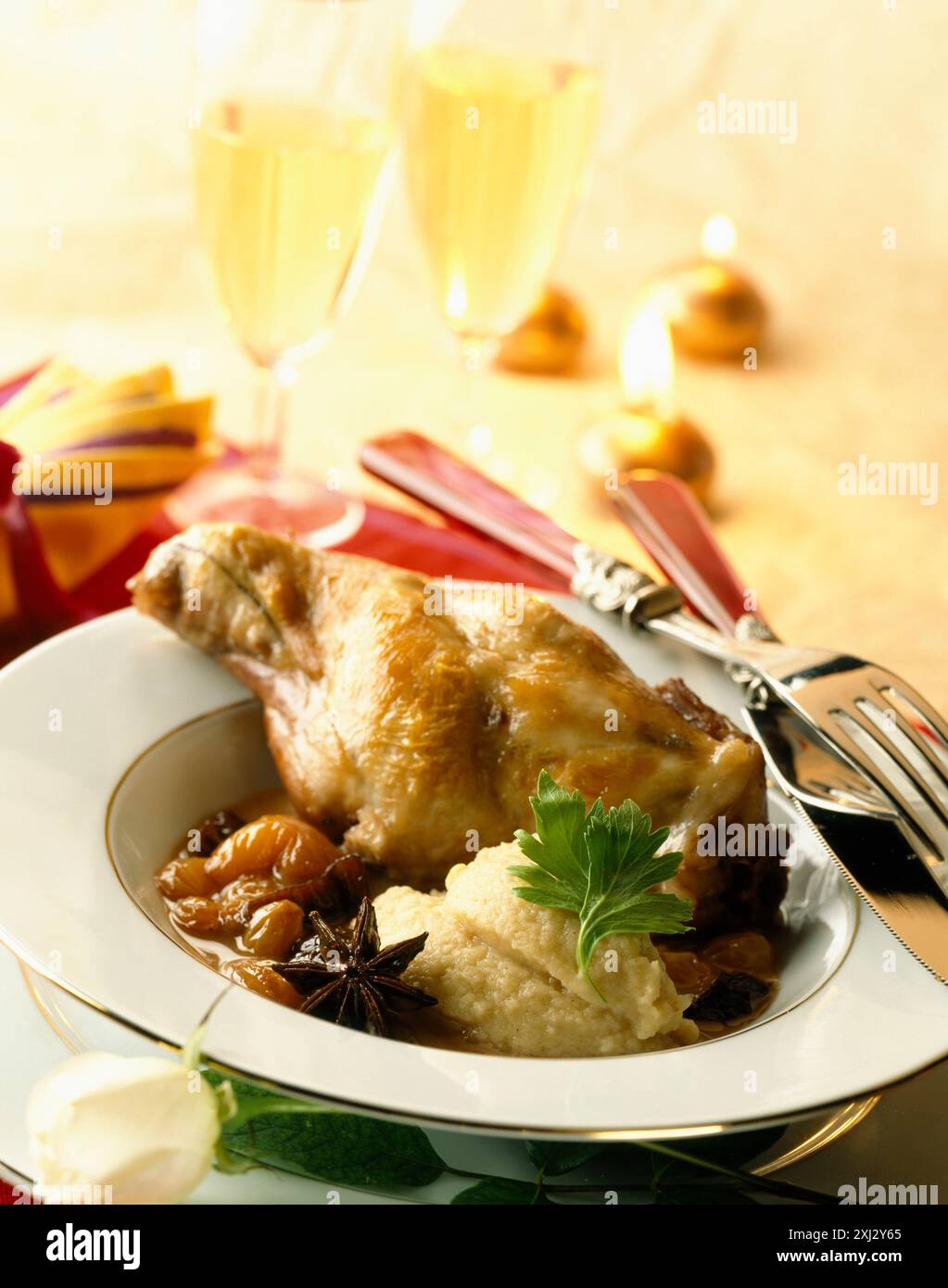 Rabbit leg with dried fruit Stock Photo - Alamy