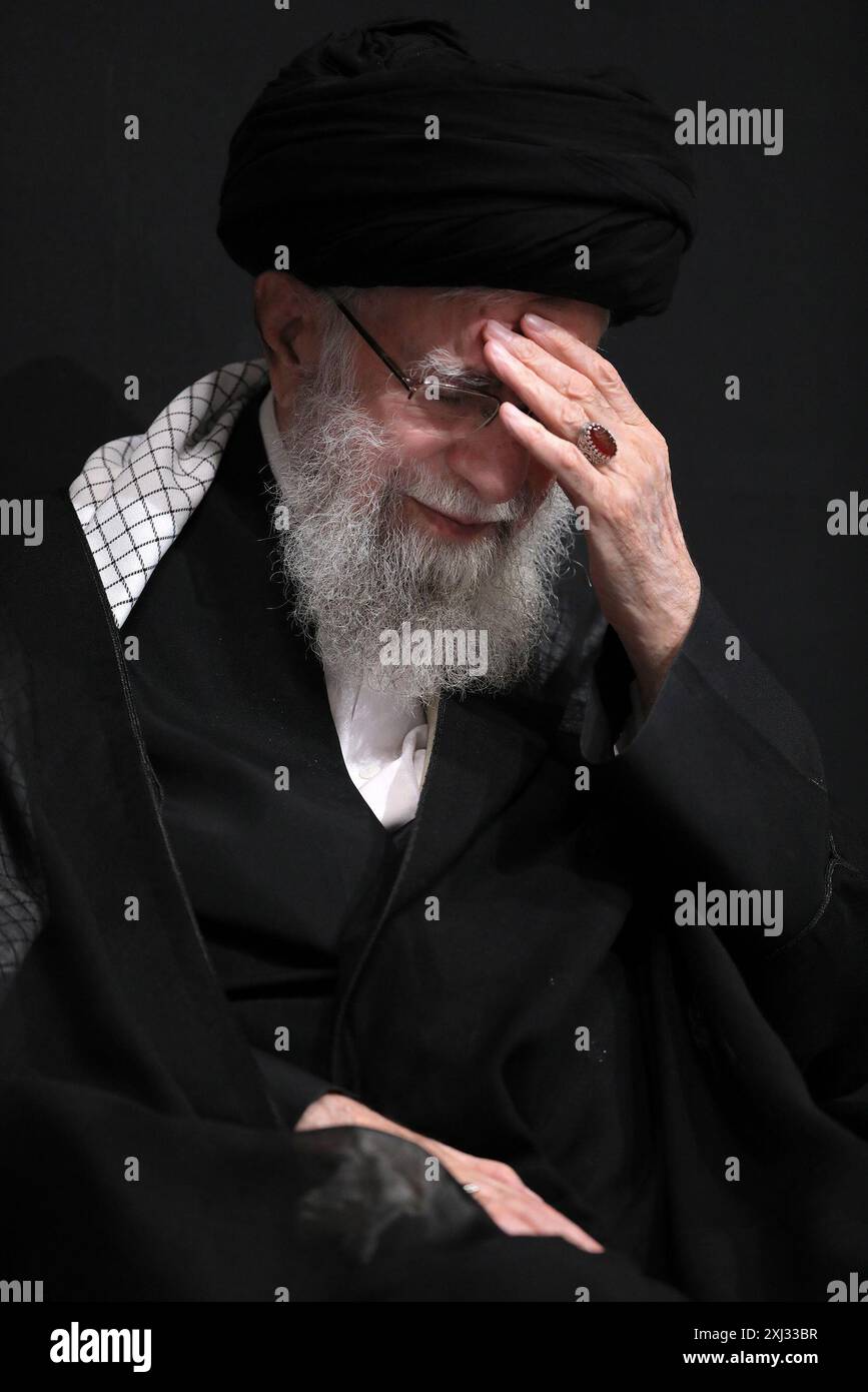 Tehran, Iran. 16th July, 2024. Iranian Supreme Leader Ayatollah ALI KHAMENEI mourns during the
