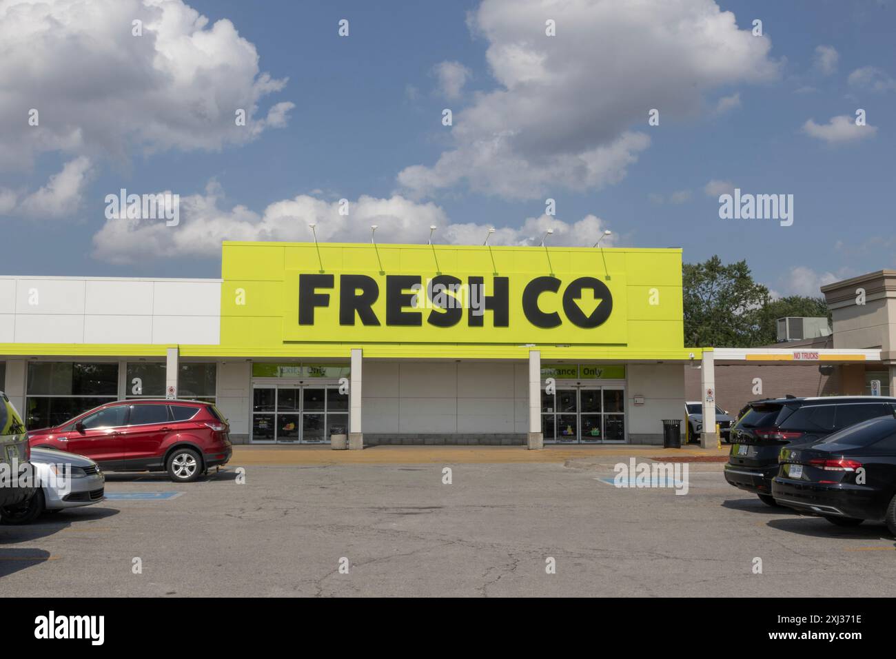 Freshco Stocker Windsor, ONT - July, 12 2024: FreshCo discount supermarket. FreshCo is ...