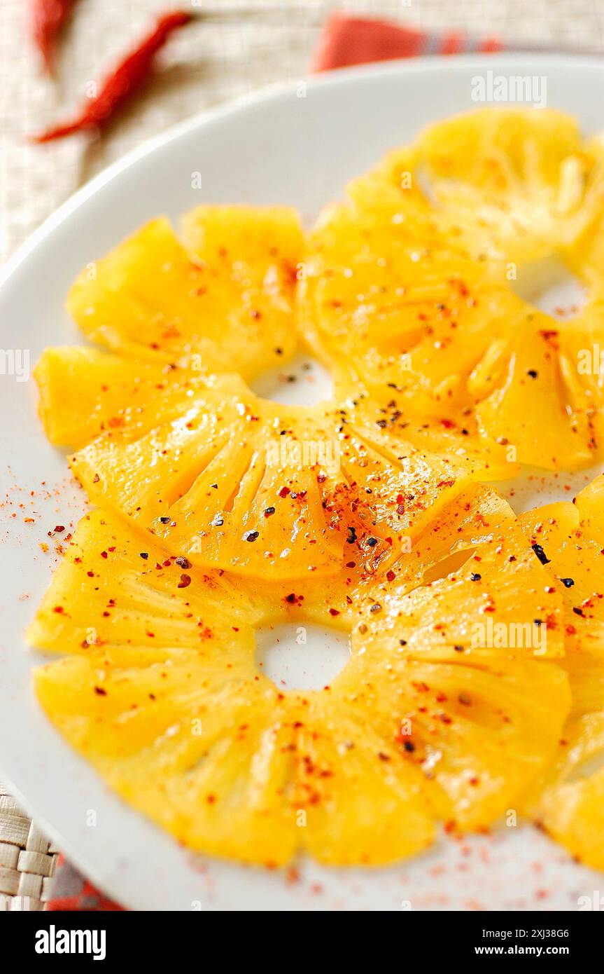 peppery pineapple carpaccio (topic: pineapple cooking) Stock Photo