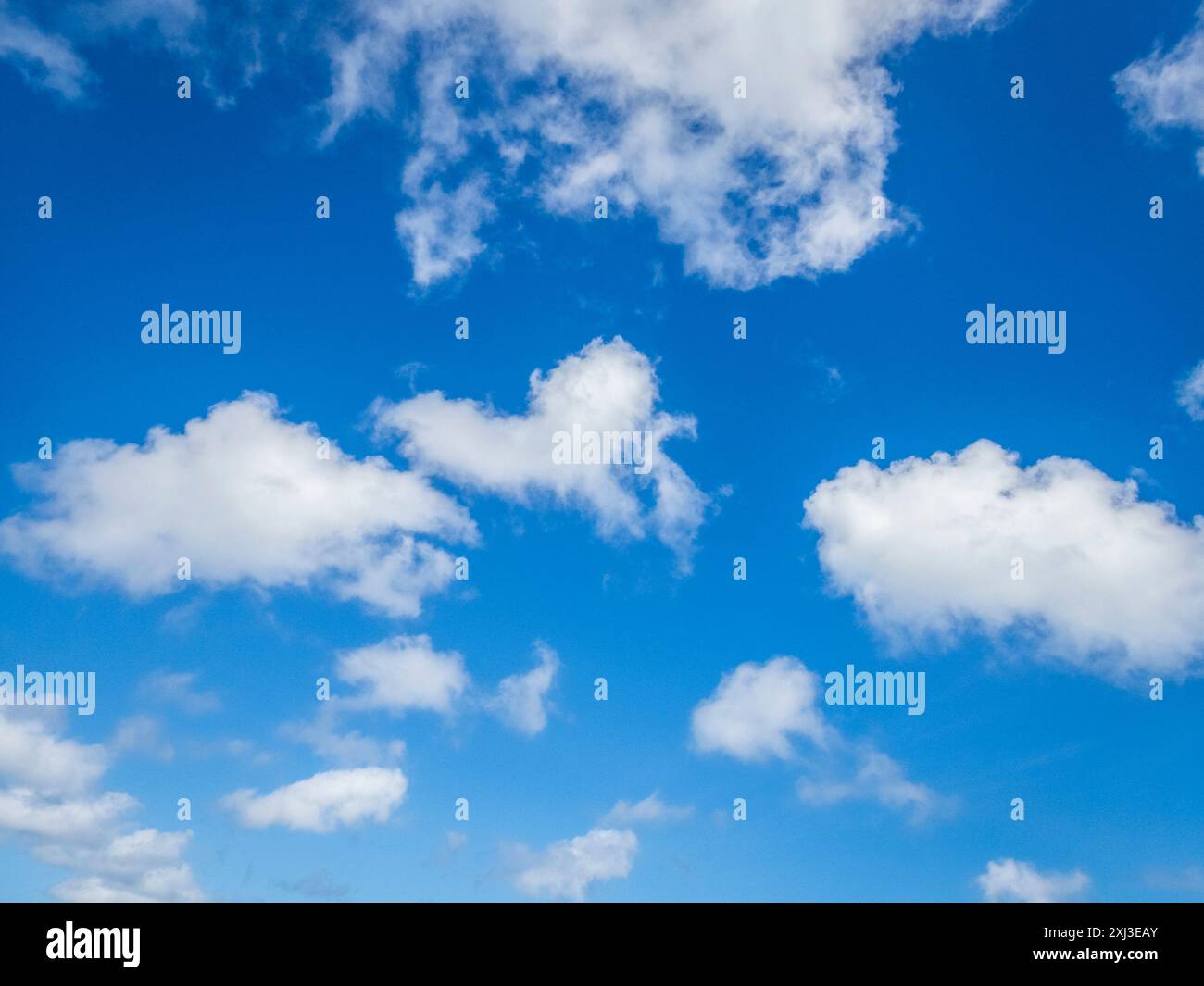White clouds in a blue sky Stock Photo