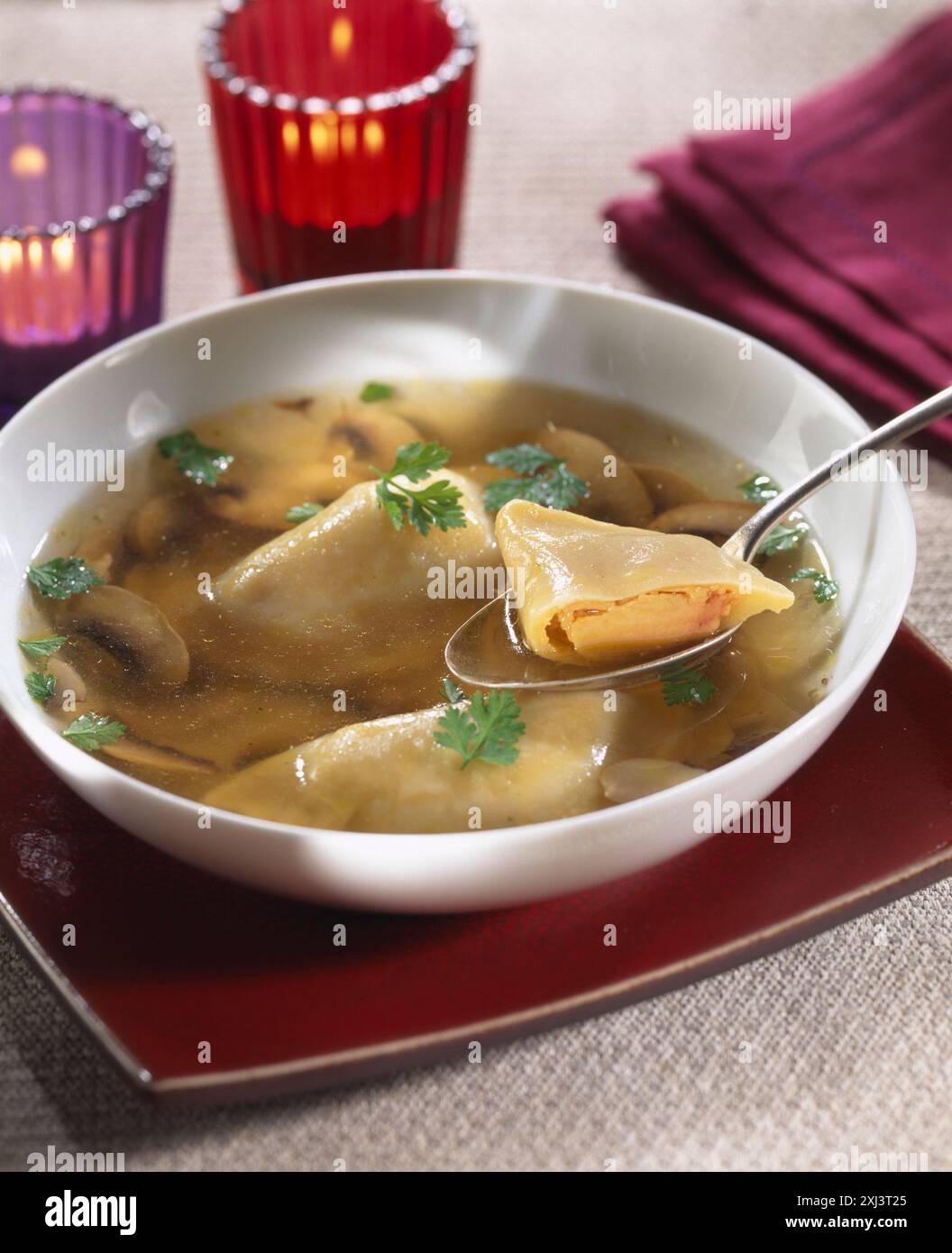 Foie gras ravioli soup Stock Photo