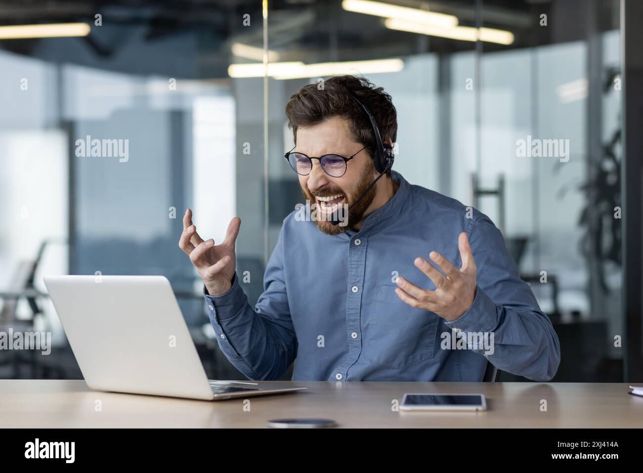 Annoyed telemarketing operator talking client hi-res stock photography ...