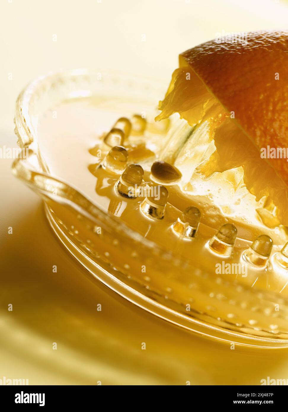 Squeezing an orange Stock Photo
