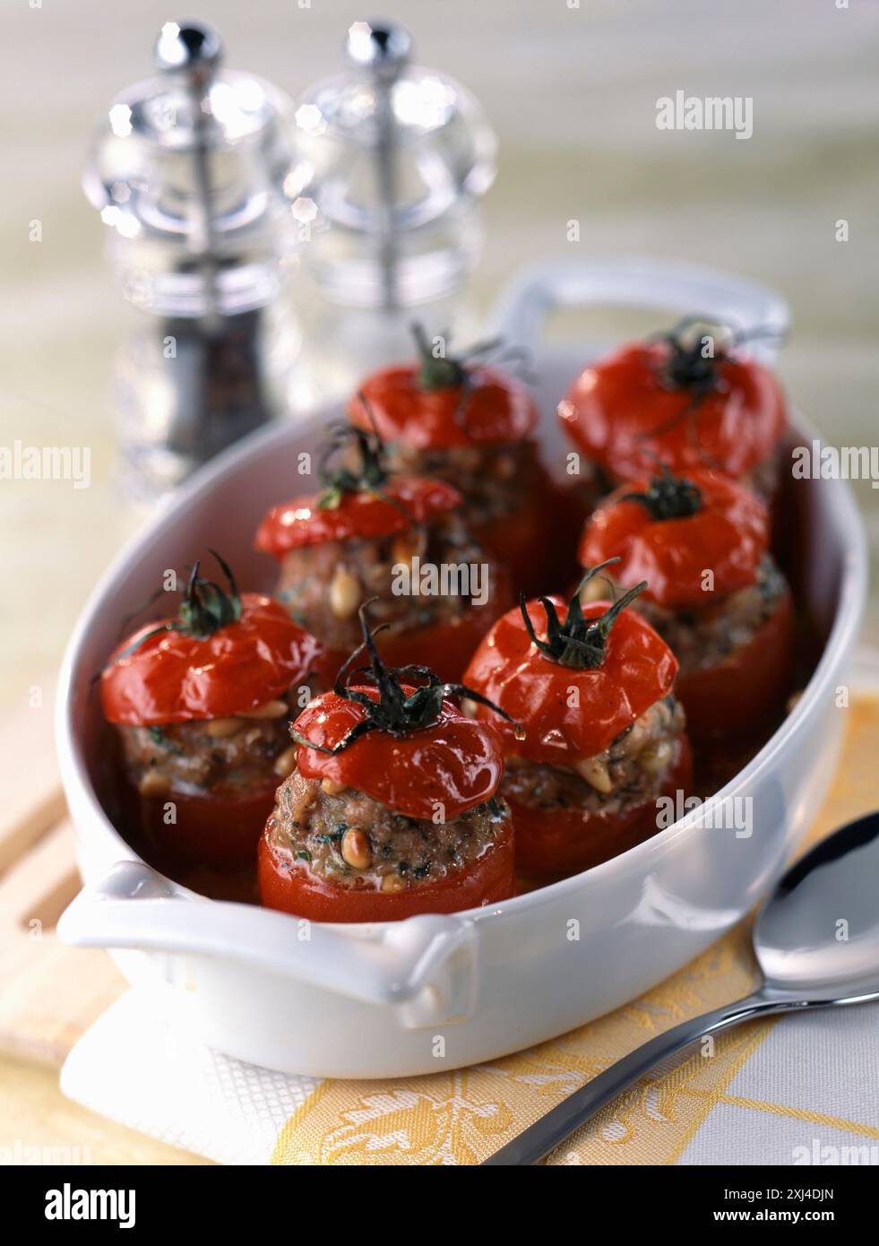 Stuffed tomatoes with pinenuts Stock Photo