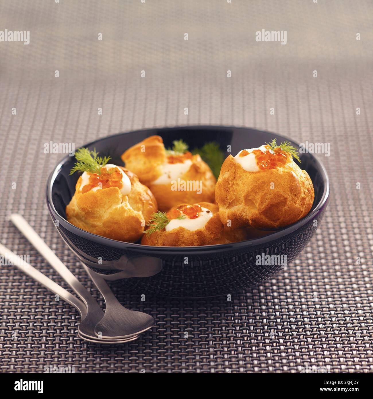 Salmon roe and dill whipped cream puffs Stock Photo - Alamy