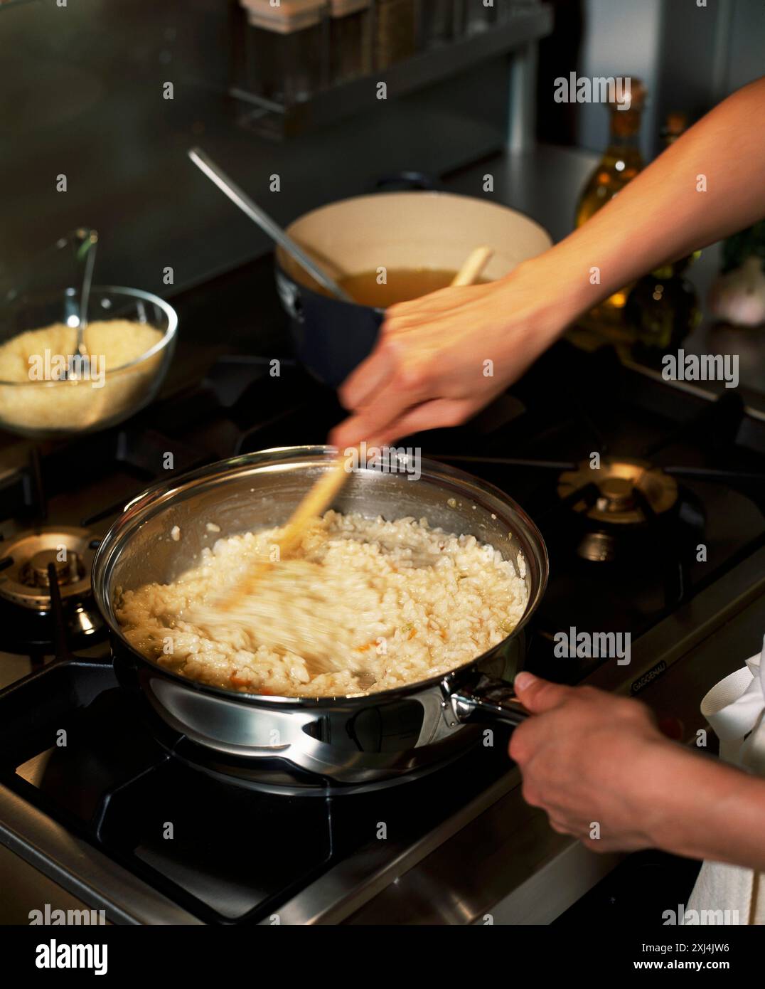 Mixing the rice Stock Photo - Alamy