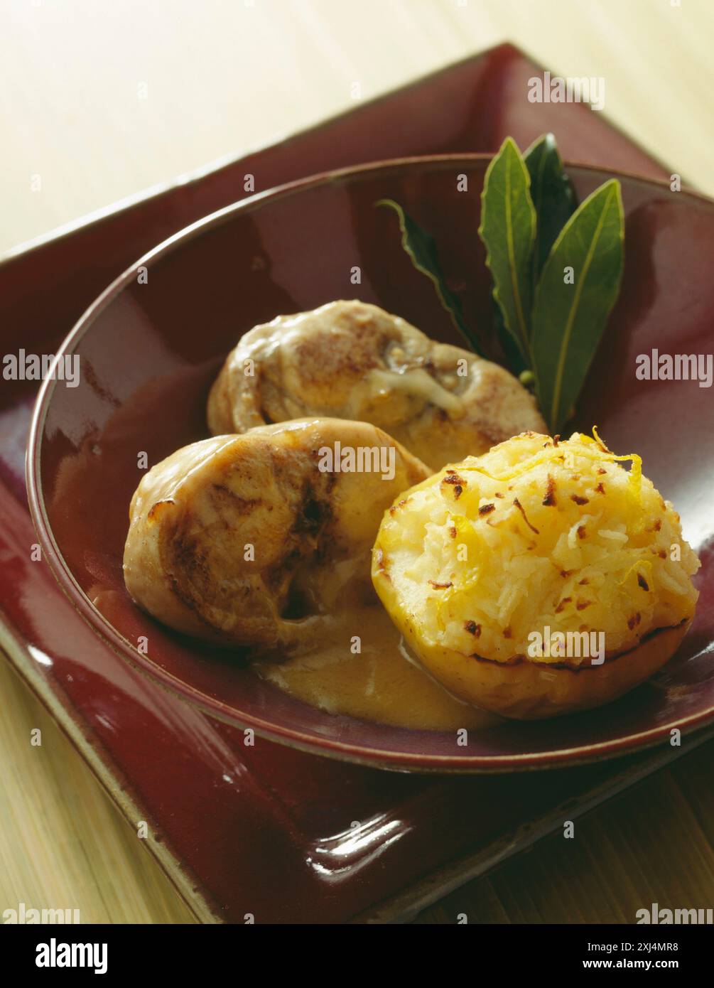 Cook Rabbit Saddle rabbit saddle with cider sauce,grated potato nest Stock Photo - Alamy