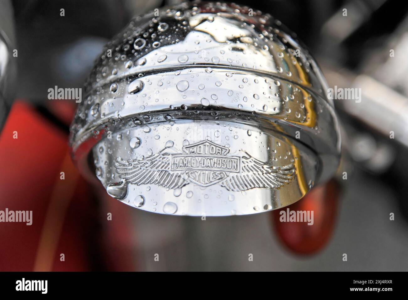 Close-up of a shiny motorbike helmet with Harley-Davidson logo and water droplets, Parque Natural Cienaga de Zapata, Zapata Peninsula, Cuba, Central Stock Photo