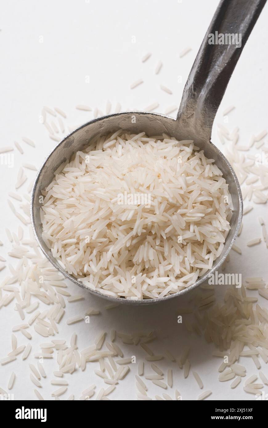 Ladle of Basmati rice Stock Photo - Alamy