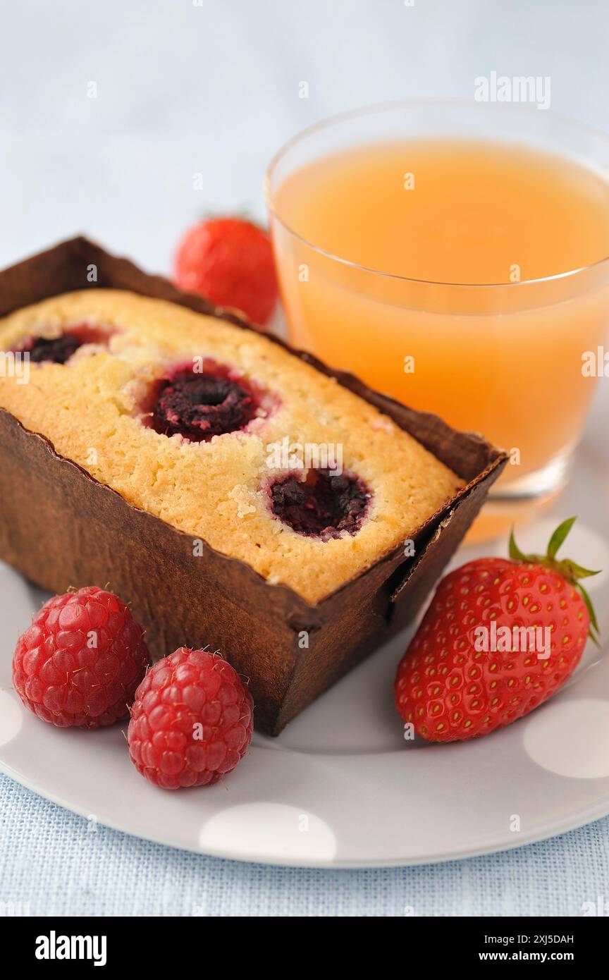 Raspberry Financiers,strawberries and grapefruit juice Stock Photo - Alamy