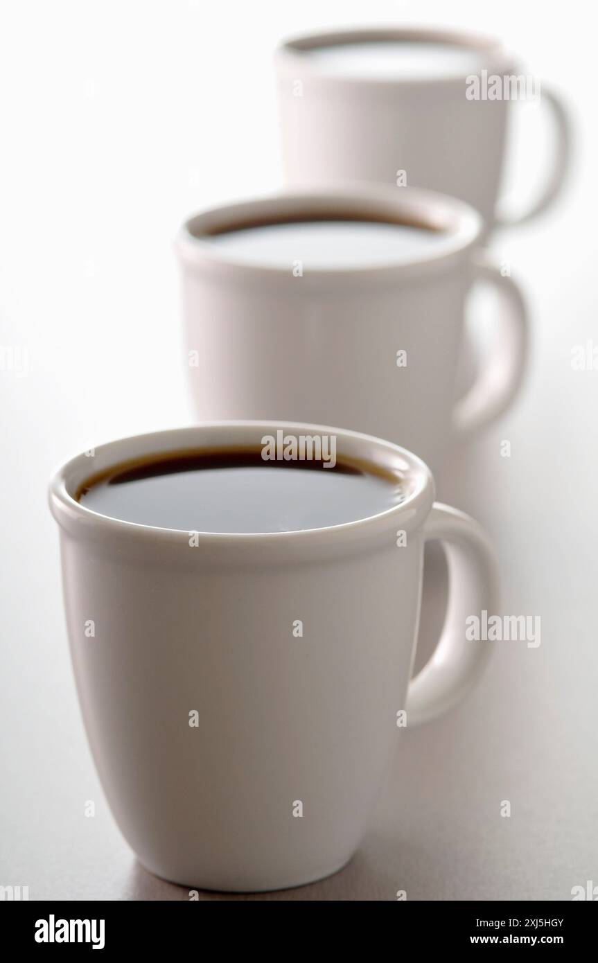 Three cups of coffee Stock Photo - Alamy