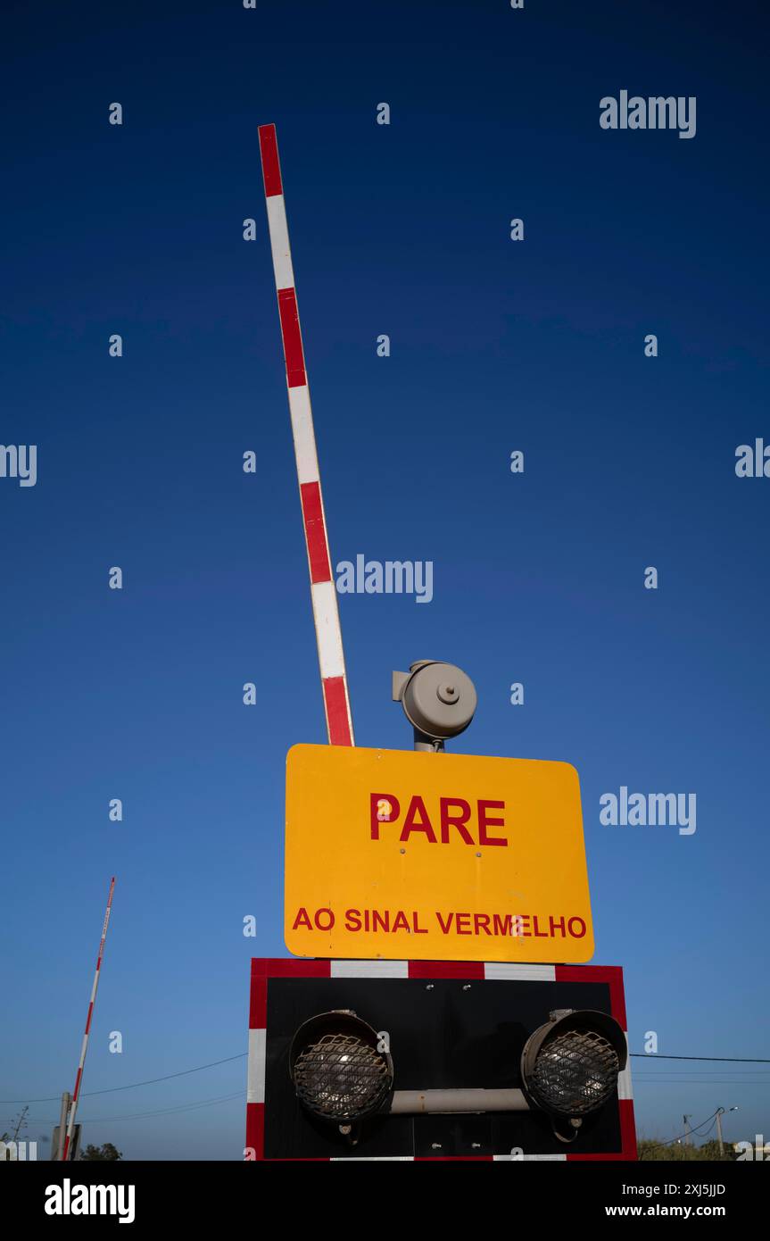 Barrier at railway crossing, open, Lagos, Algarve, Portugal Stock Photo