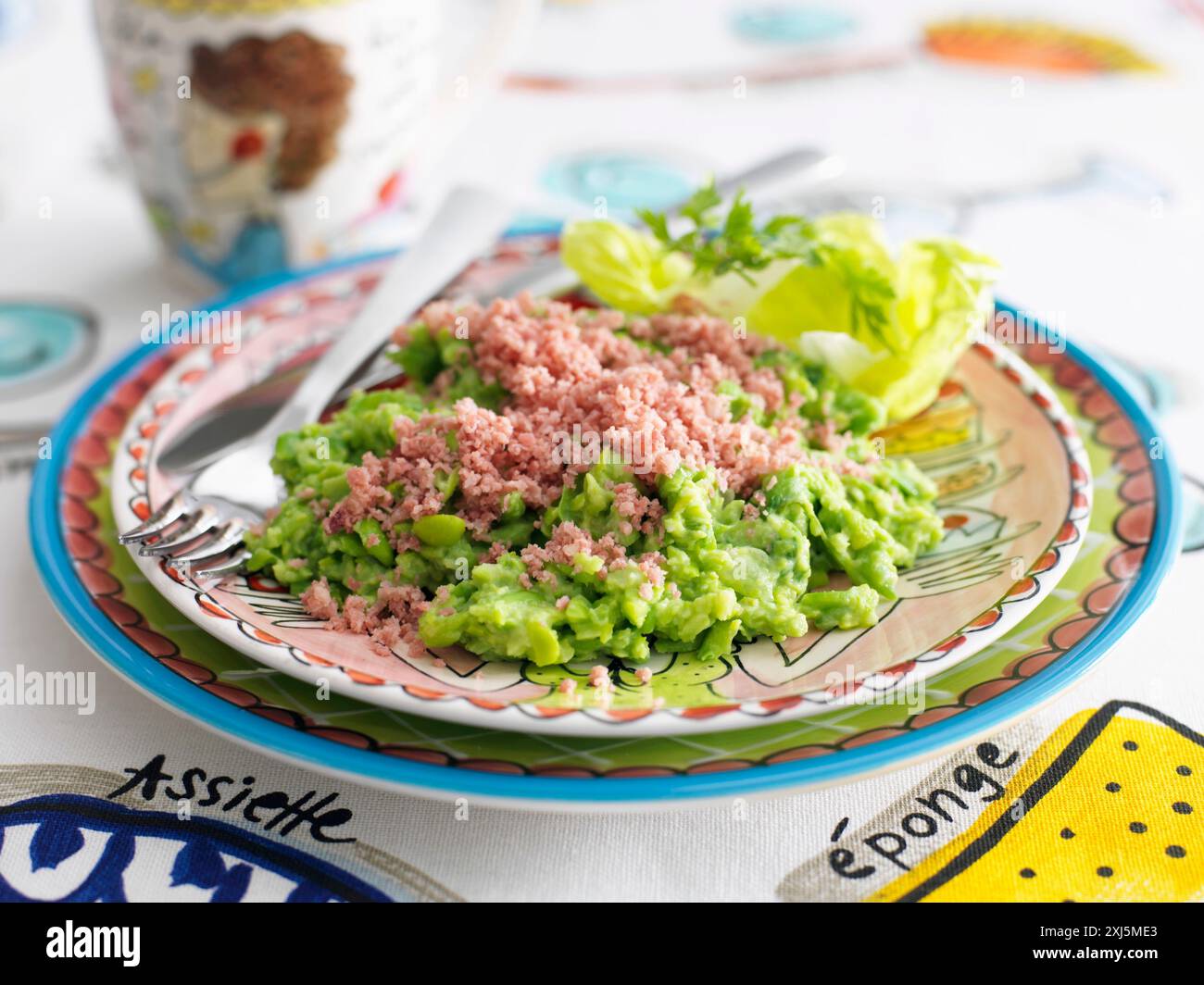 Mashed peas with minced ham and lettuce Stock Photo