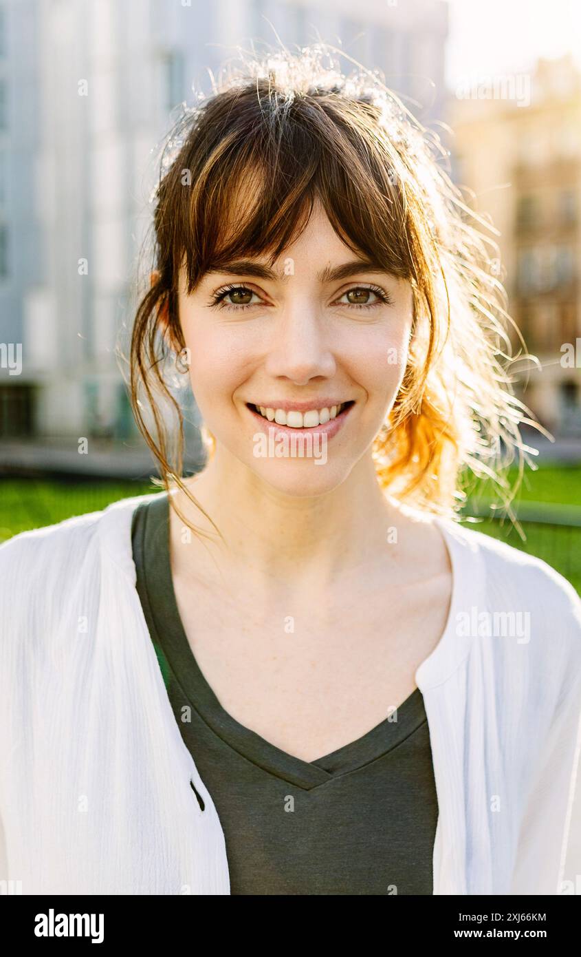 Outdoors portrait of beautiful young girl smile at camera Stock Photo ...