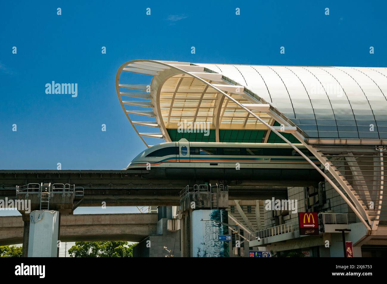 The Shanghai Maglev train departing its Longyang Road terminus station ...