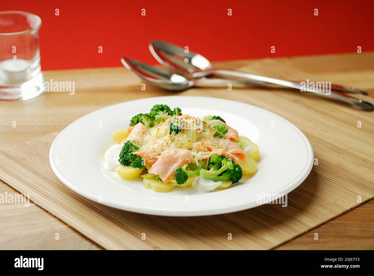 Salmon with potatoes and gratinated broccoli Stock Photo