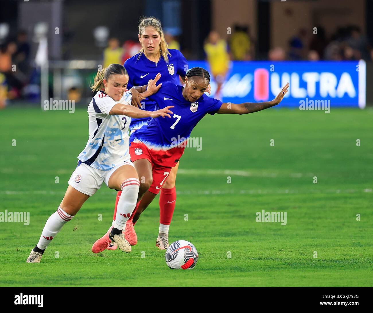 Washington DC, USA. 16th July, 2024. Costa Rican National Team Defender (3) Maria Paula Coto and USWNT Forward (7) Crystal Dunn battle for the ball during an international friendly between the United States Women's National Team and the Costa Rican Women's National Team at Audi Field in Washington DC. Justin Cooper/CSM (Credit Image: © Justin Cooper/Cal Sport Media). Credit: csm/Alamy Live News Stock Photo