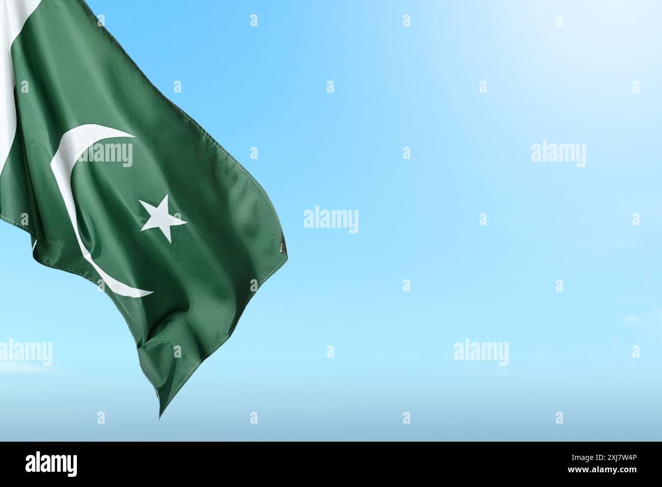 Pakistan Rostam Poles Pole with Pakistan flag waving in the air. Pakistan Independence Day ...