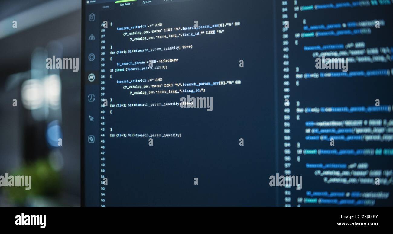 Close Up Focus on Desktop Computer Screen. Digital Display Showing Coding Language User Interface. Software Engineer Programming Innovative e-Commerce Software in Office Stock Photo