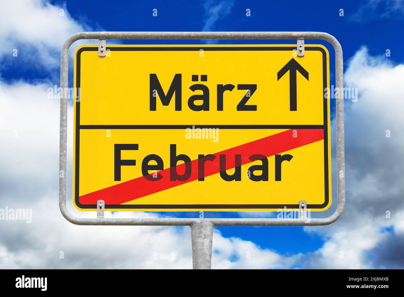 16 July 2024: Town sign with the month of February and March. Symbolic image of the beginning and end of the month. PHOTOMONTAGE *** Ortsschild mit dem Monat Februar und März. Symbolbild Monatsanfang und Monatsende. FOTOMONTAGE Stock Photo