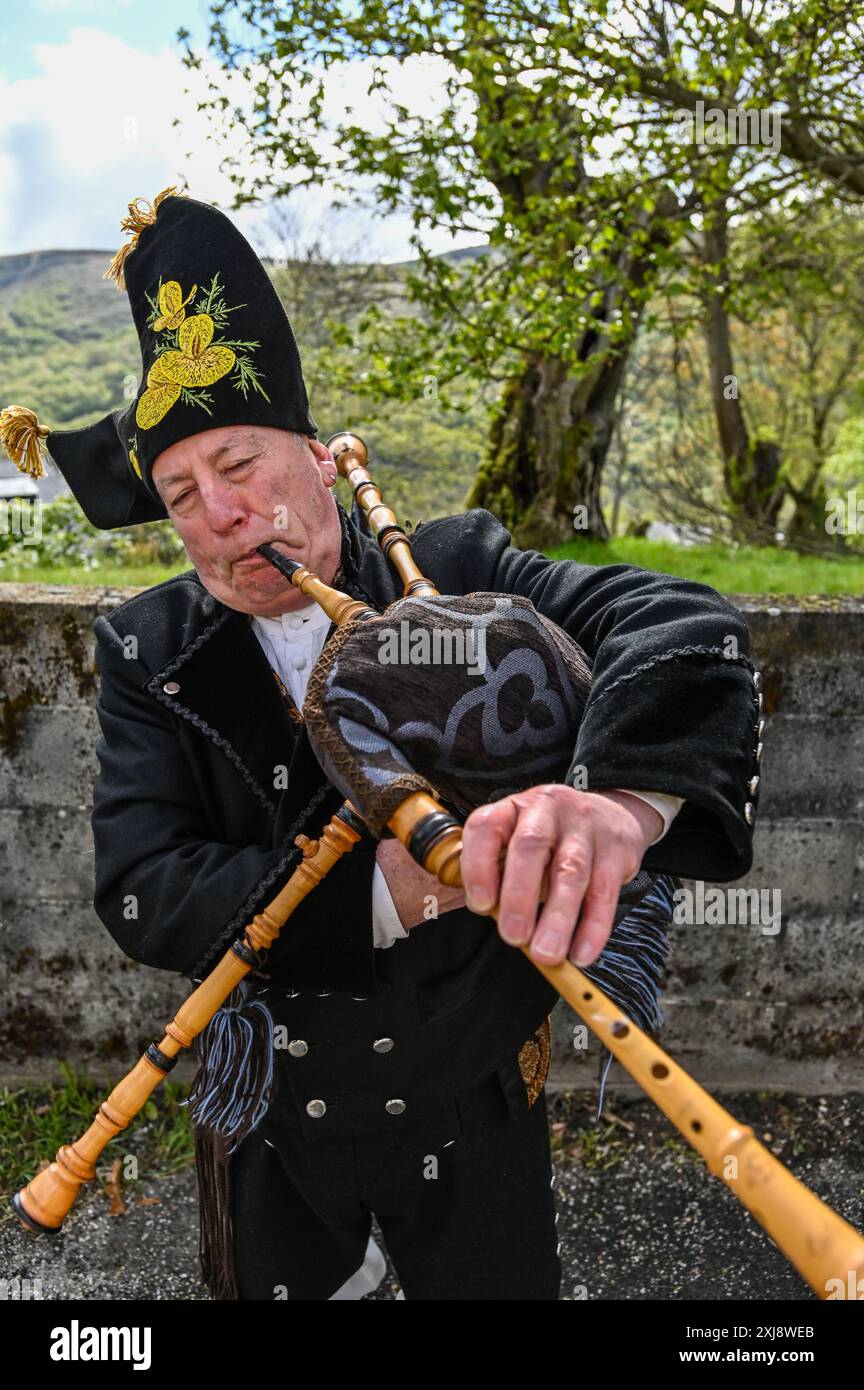 A traditional Gaiteiro from Galicia, dressed in classic attire with a ...