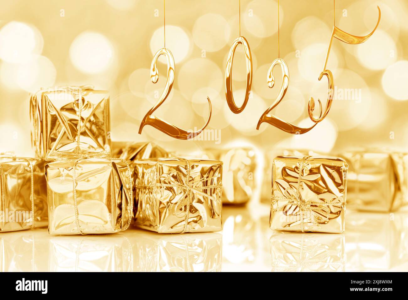 2025, new year card. Small Christmas gifts in shiny golden paper, bokeh