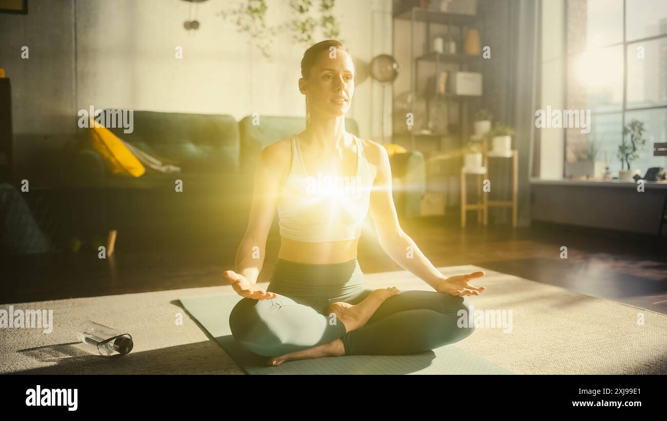 Beautiful Relaxed Caucasian Woman Meditating In Loft Apartment Living ...
