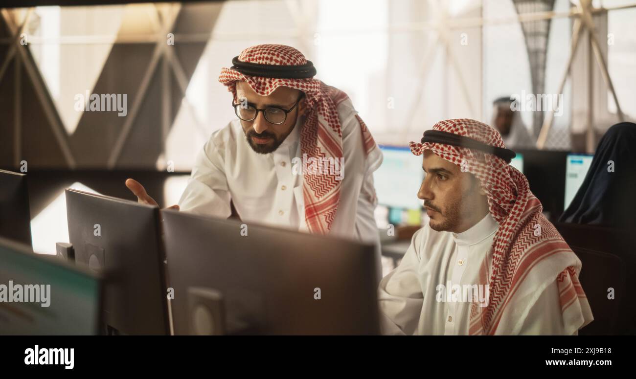 Arab man using new technology hi-res stock photography and images - Alamy