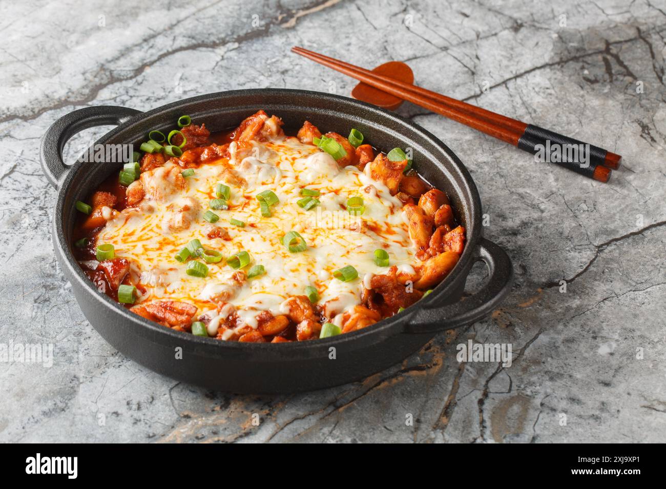 Buldak is a South Korean spicy barbecued chicken dish closeup on the ...