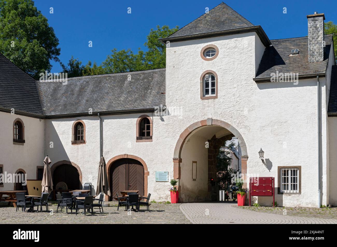 Europe, Luxembourg, Wiltz, Schlass Wolz (Wiltz Castle) and the Stables housing the Museums of Tanning and Brewing Stock Photo