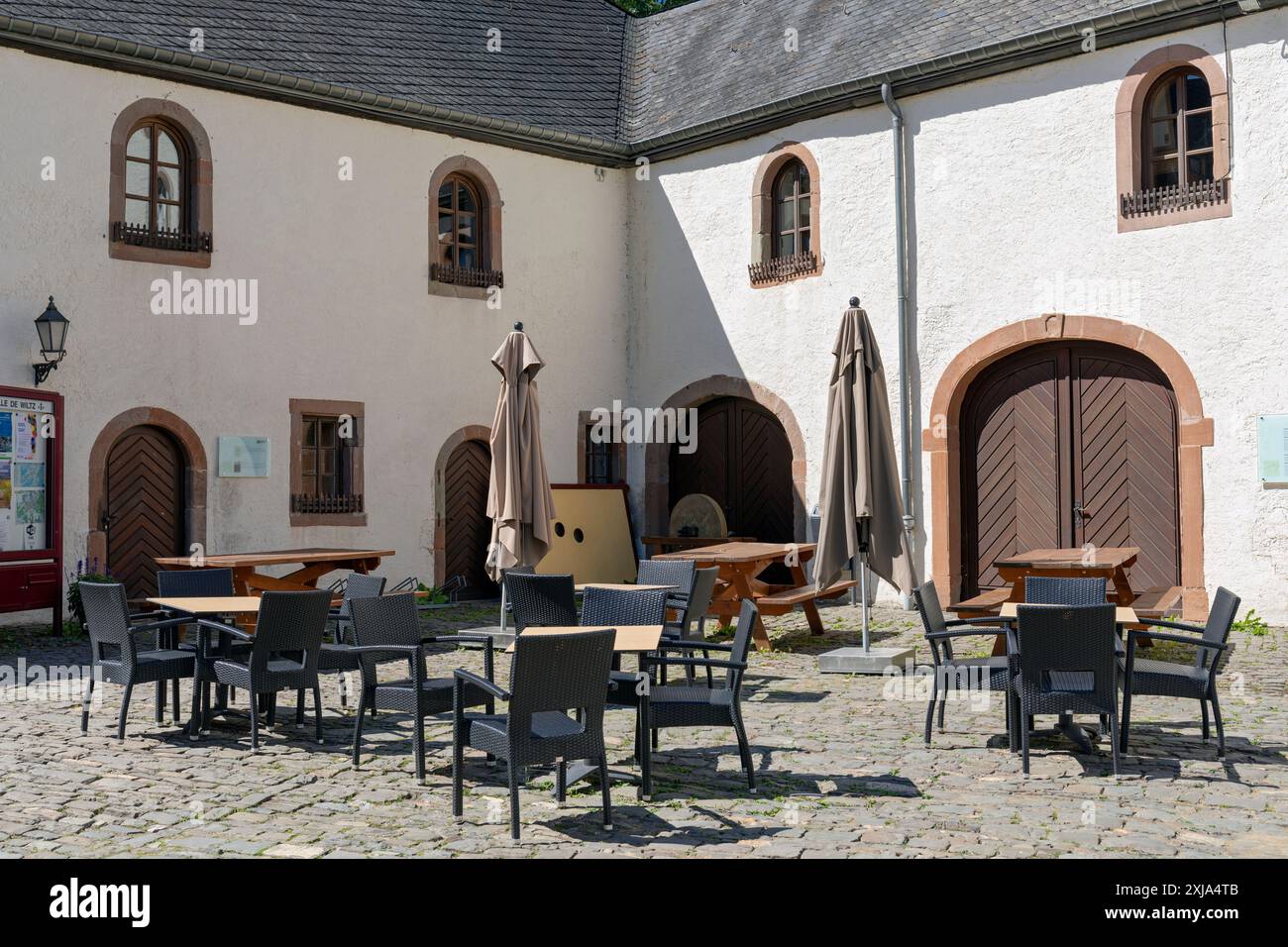 Europe, Luxembourg, Wiltz, Schlass Wolz (Wiltz Castle) and the Stables housing the Museums of Tanning and Brewing (closed during Covid-19 Lockdown) Stock Photo