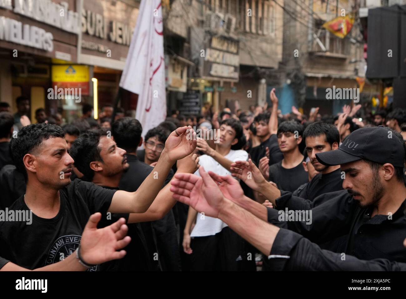 Indian Shiite Muslims beat their chests at a procession to mark Ashoura ...
