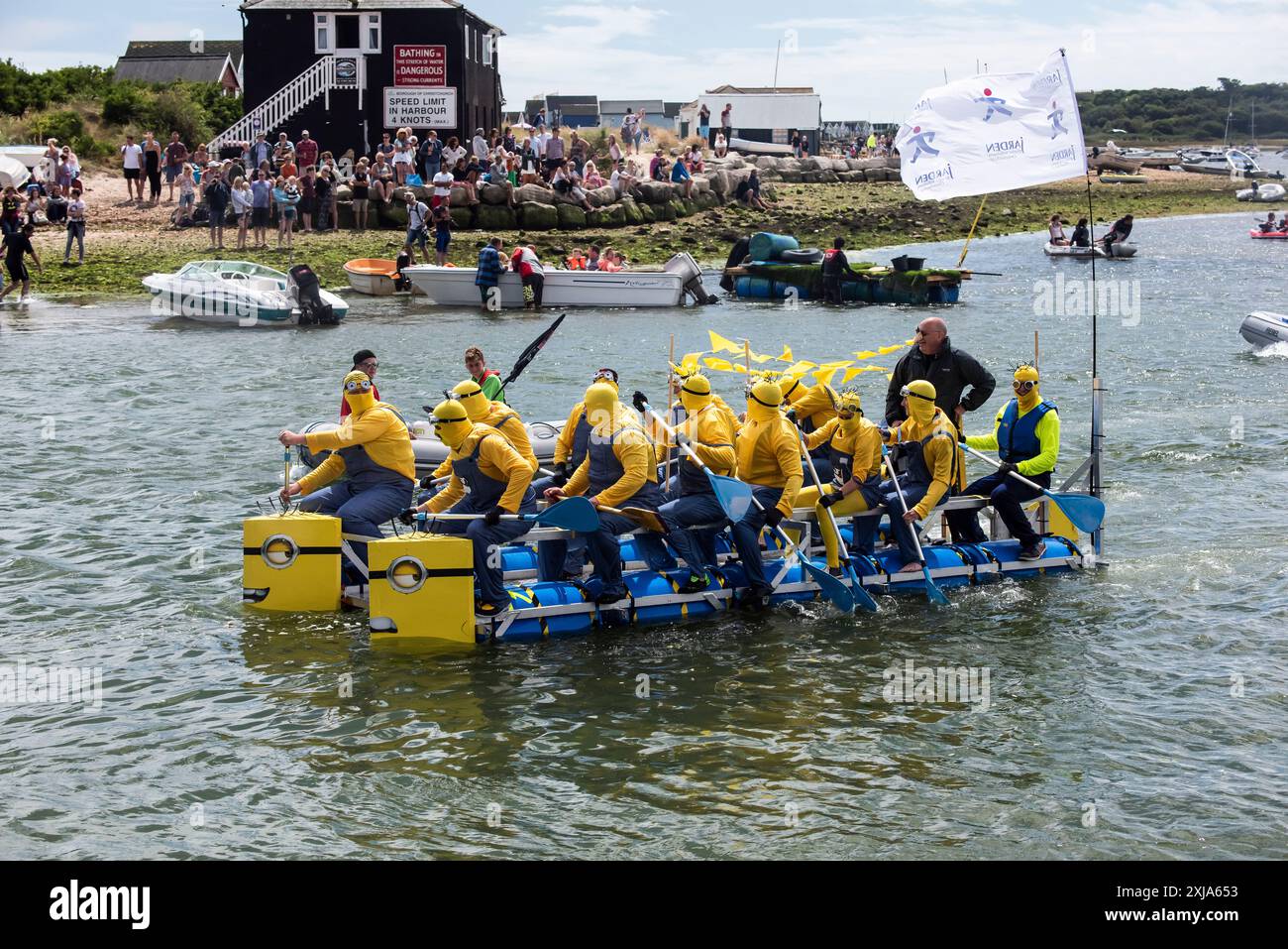 Mudeford RNLI fun day, charity event raft race in the harbour Stock ...