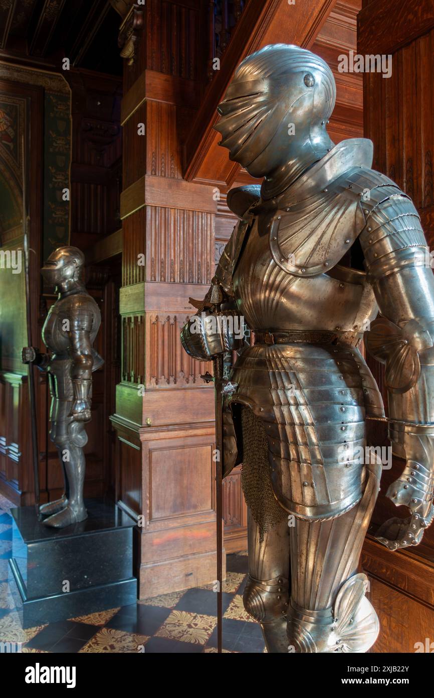 Suit of armour in the Guard Room in the Kasteel van Gaasbeek, medieval castle but renovated in the 19th century, Lennik, Flemish Brabant, Belgium Stock Photo