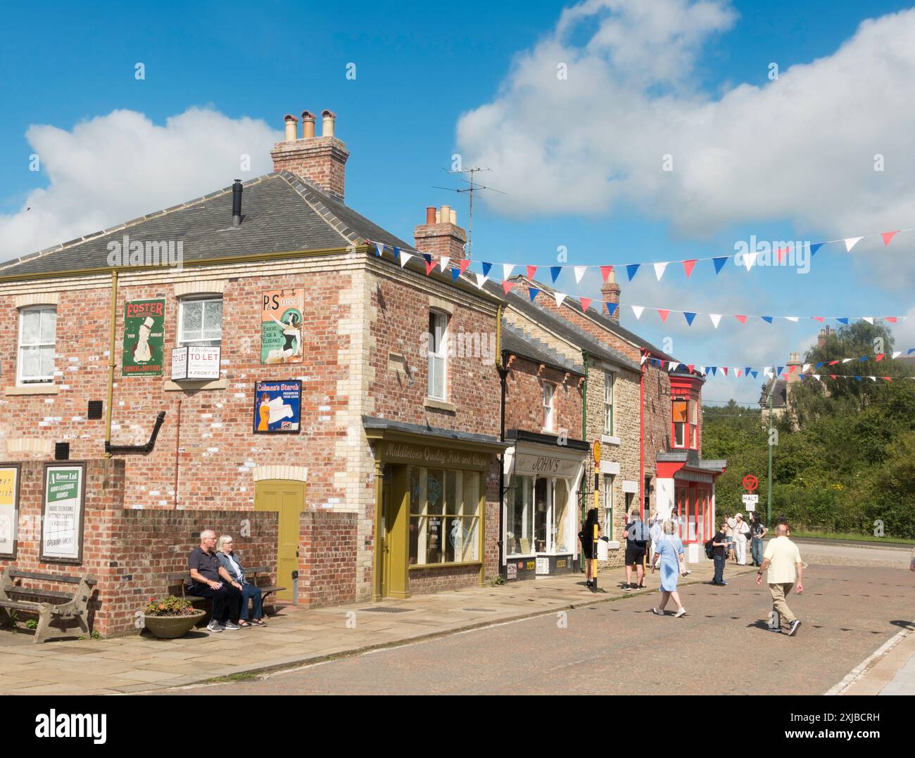 Visitors in the 1950s era town at Beamish Museum, north east England ...