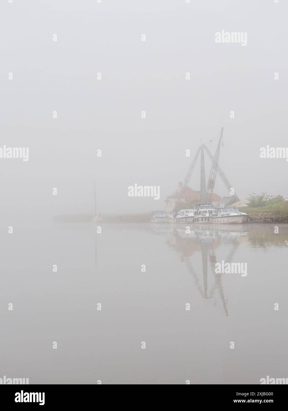 Misty Morning on the river Yare at Reedham on the Norfolk Broads Stock Photo