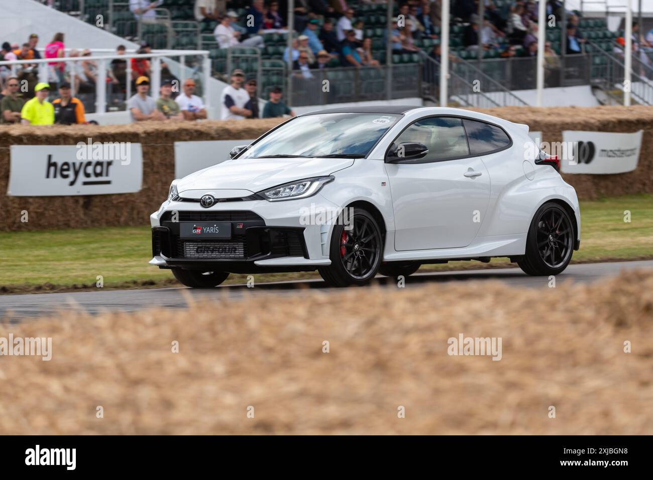 2024 Toyota GR Yaris car driving up the hill climb track at the ...